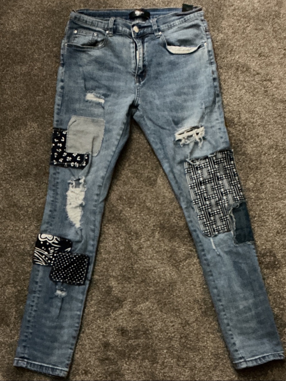 AMIRI Light Blue Distressed Patchwork Skinny Jeans
